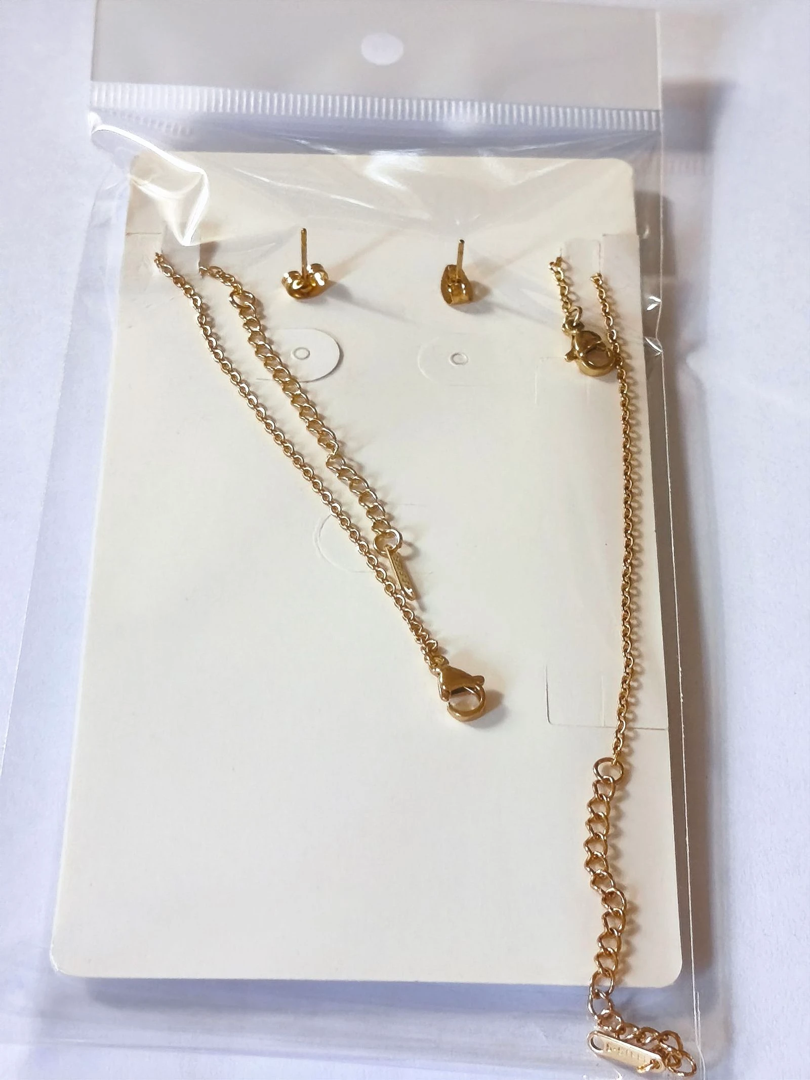 Set of luminous green clover necklace, bracelet and earrings with unalterable golden chain – photo 6